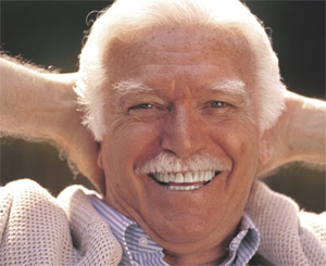 Photo of older man with good teeth smiling