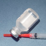 Photo of local anesthesia bottle and needle